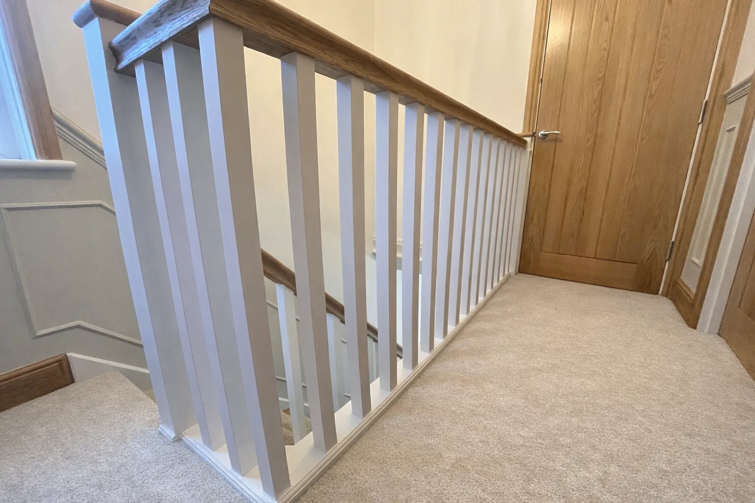 Landing banister stair refurbishment by LM Carpentry in Neath Port Talbot