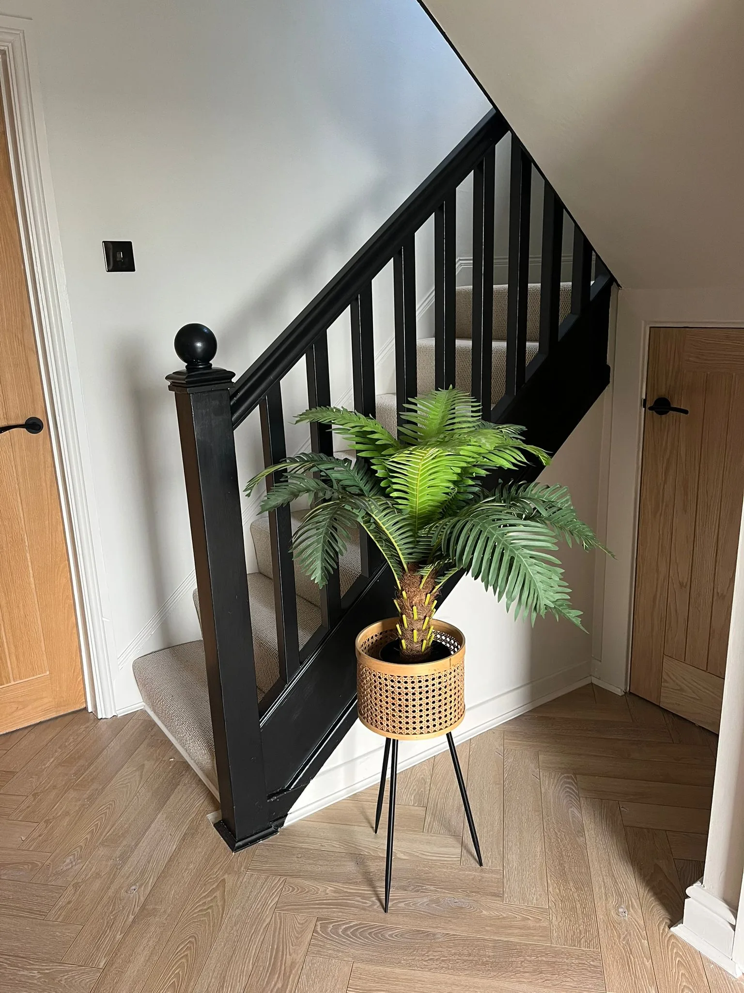 Bespoke stair refurbishment with oak cladding and glass balustrade