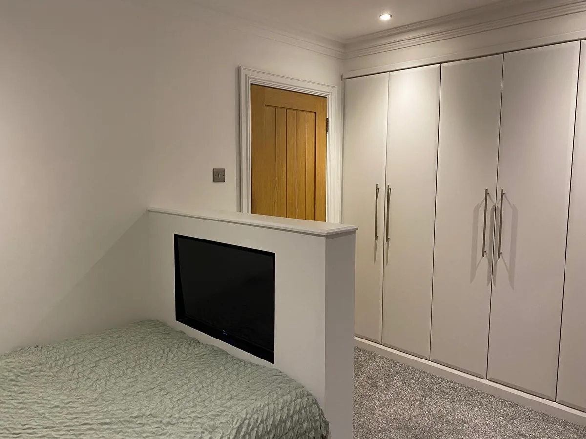 Custom bedroom storage with fitted shelving in Neath Port Talbot