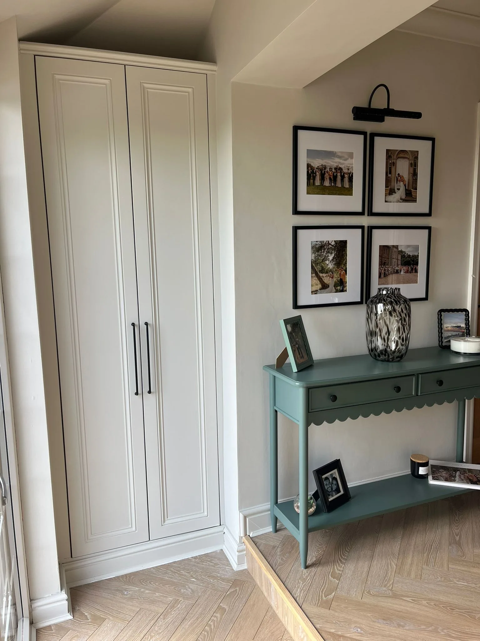 Cream shaker style fitted wardrobes with herringbone floor in Swansea