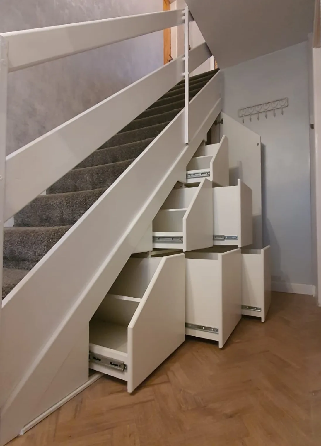 Under stairs pull-out drawers with white finish and soft-close runners in Swansea